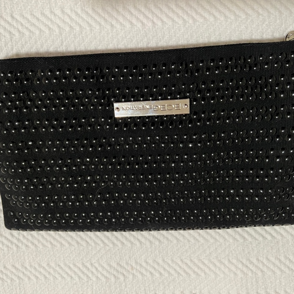 BCBG studded fold over clutch
